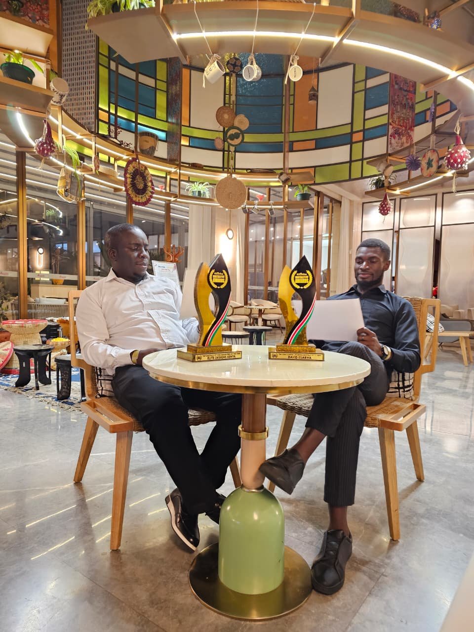 Elite Designs Kenya co-founders Gregory Shikutwa and David Esabwa with their Digitally Fit Awards 2026 trophies